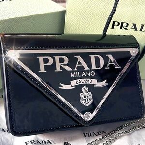 Preowned Prada Mini crossbody card holder.